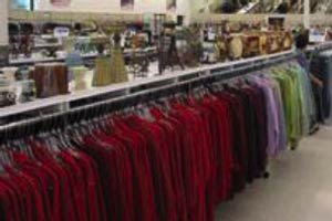 A rack of clothing at a Goodwill retail store A rack of clothing at a Goodwill retail store