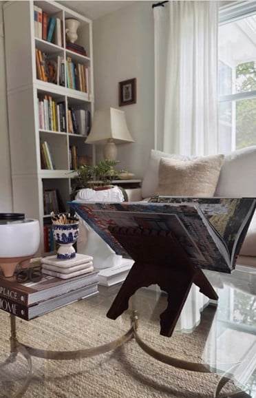 A book in a stand on top of a table