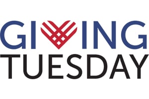 Giving Tuesday logo featuring a red heart replacing the V in GIVING with TUESDAY below in black.