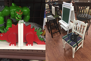 Green action figure toy beside bright red gear shapes in a retail display