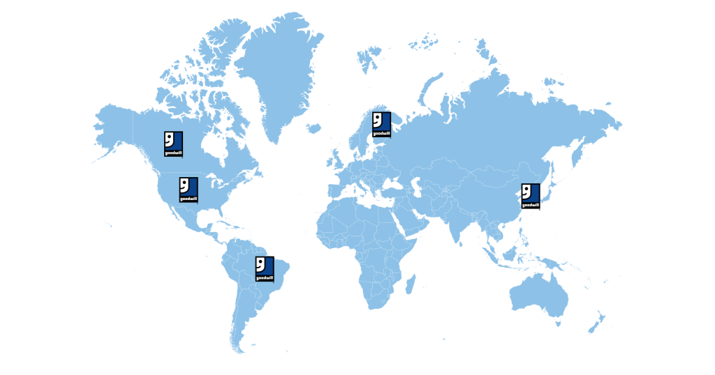 World map with Goodwill logos pinned across North America, Europe, Asia, and Africa.