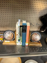 Books in between two globes