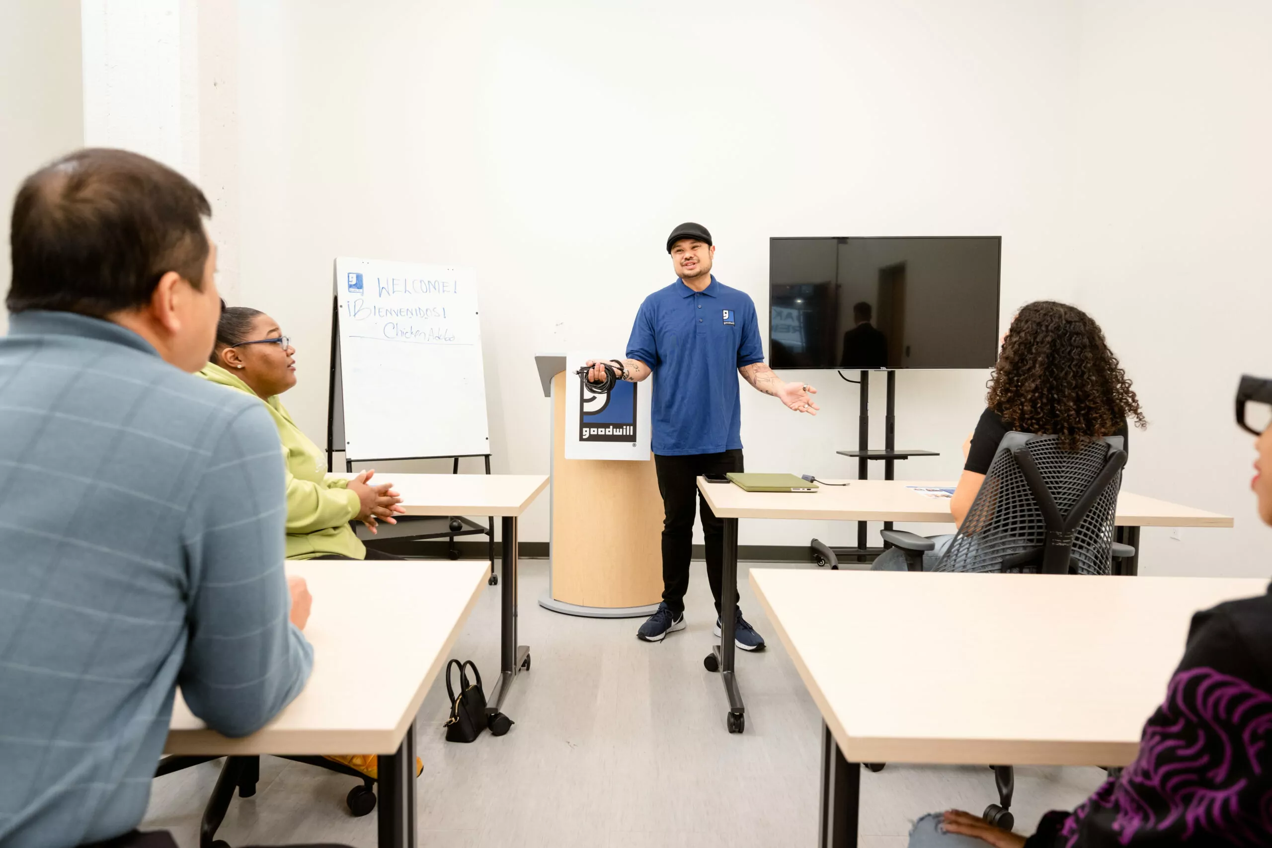 Man standing in front of a classroom